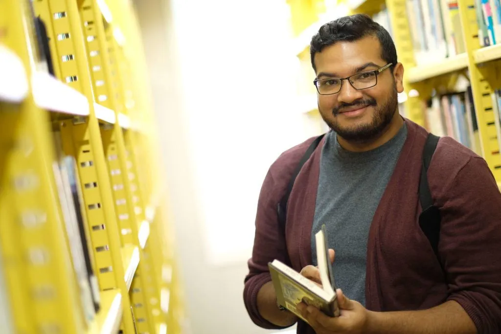 student in stacks