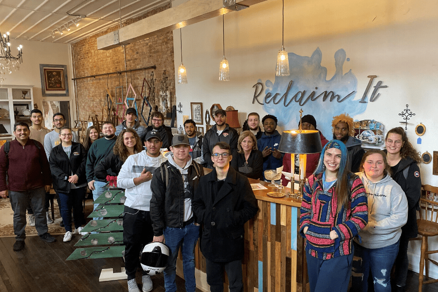 college students at reclaim it shop