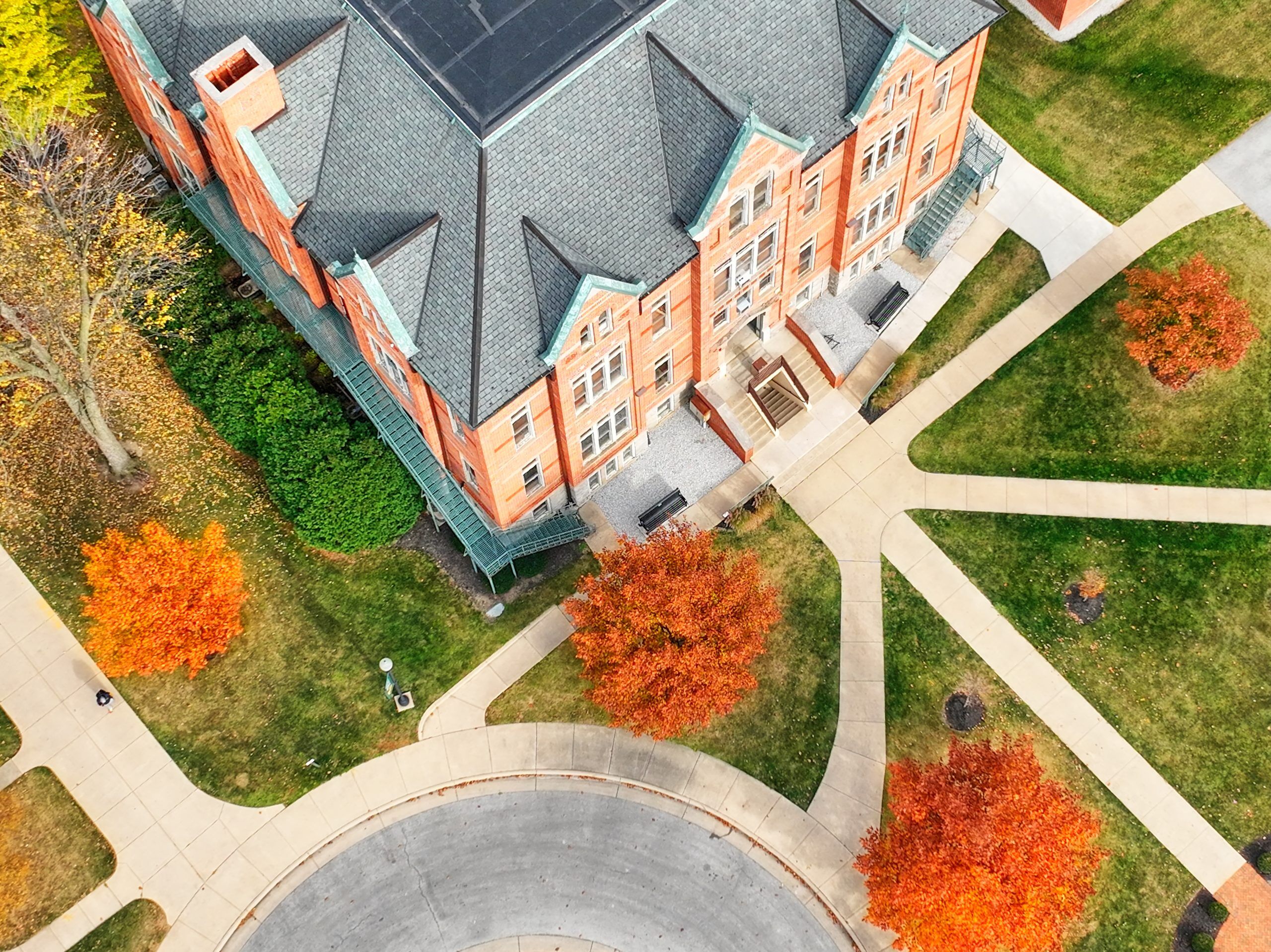 a scenic photo of campus in the fall from the drone