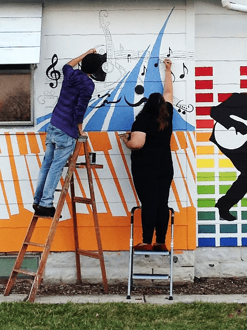 painting mural on house