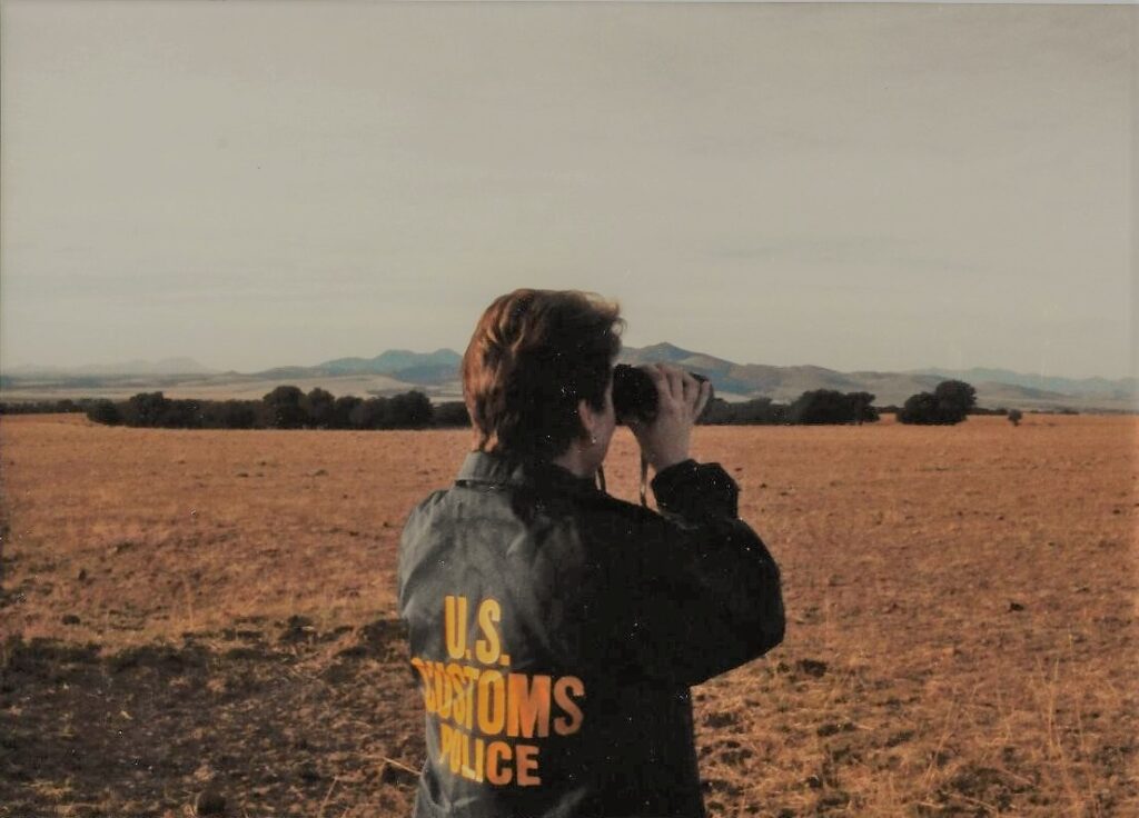 theresa nibblett looking through binoculars