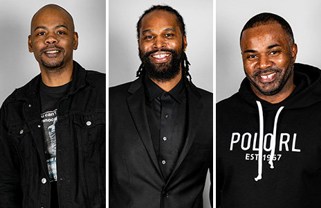 three african american men in black shirts