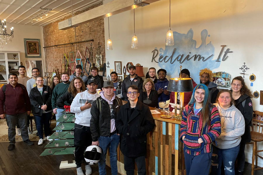 college students at reclaim it shop