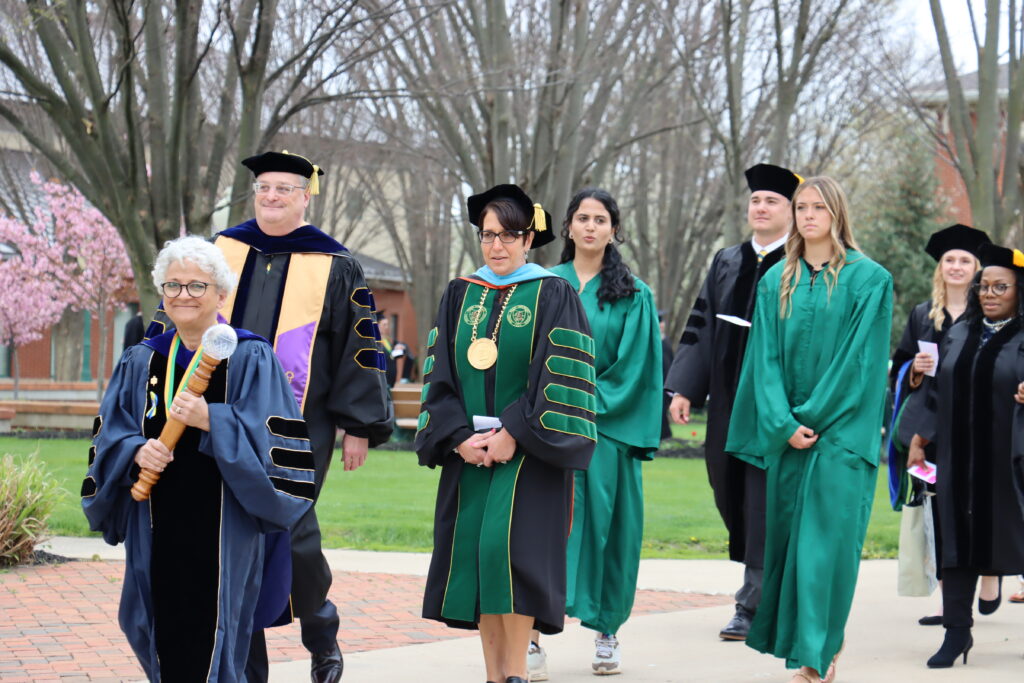 graduation procession with dr.victor and president schumacher