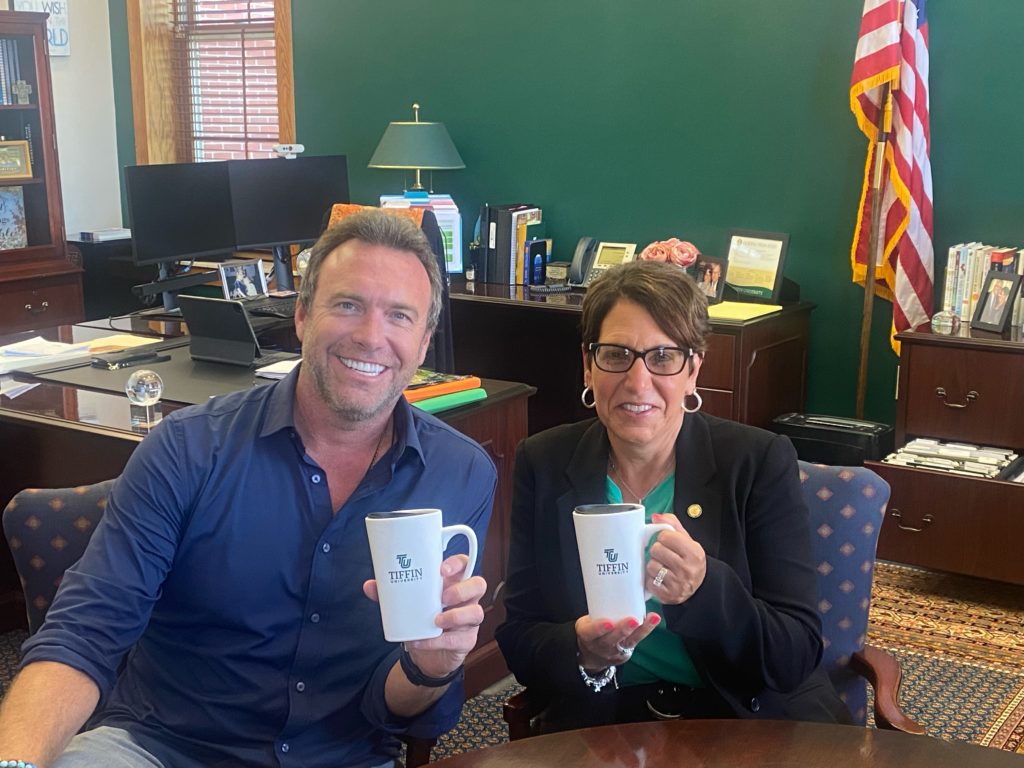 alex boylan and president schumacher with coffee cups