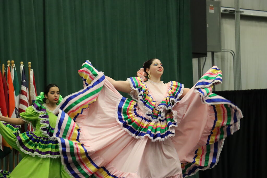 a female mexican dancer performing on stage
