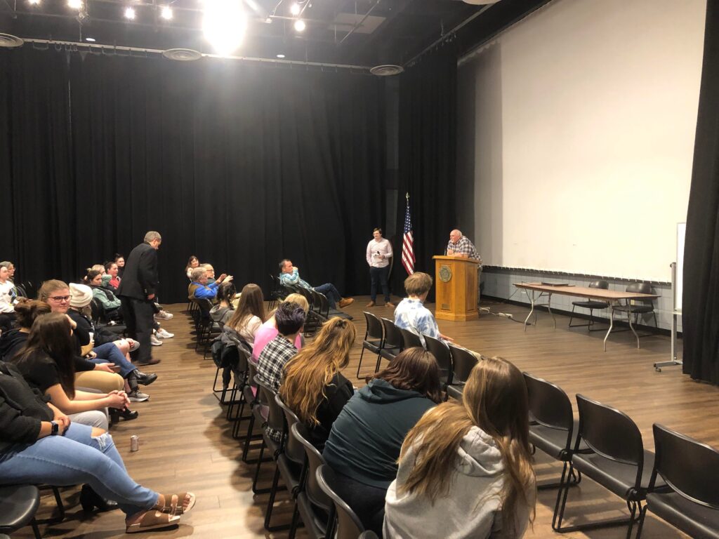 Group of students listening to OIP Speaker