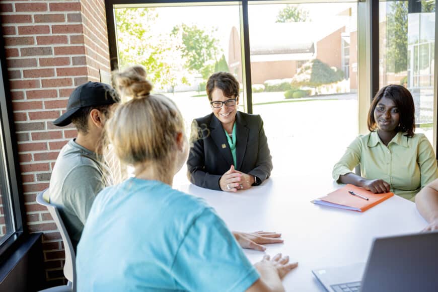 president schumacher with students