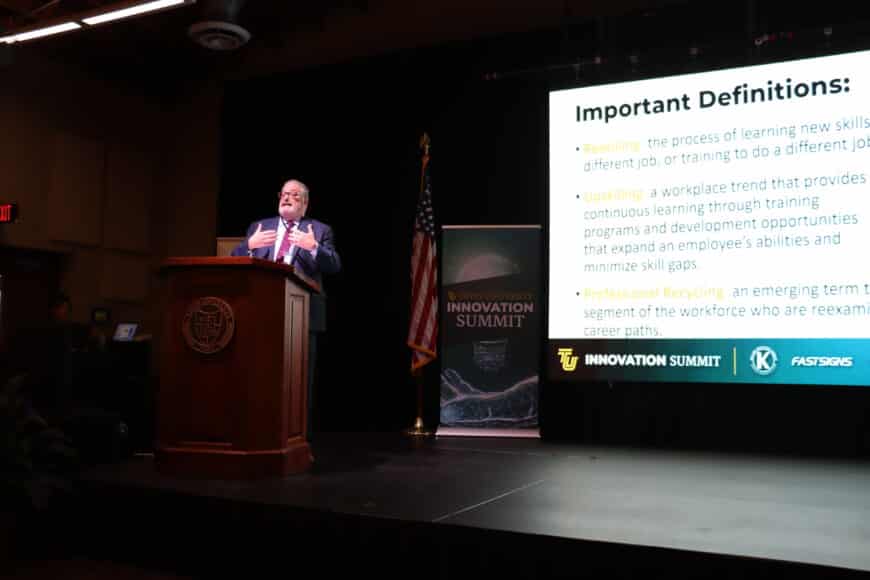 provost on stage at the innovation summit