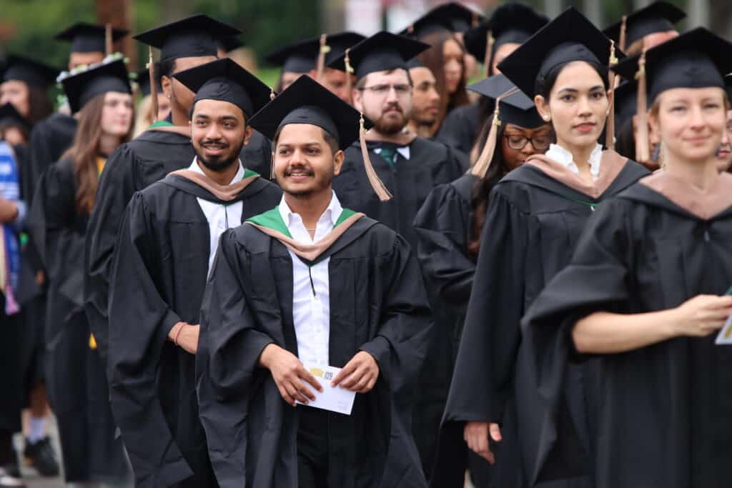 smiling students at graduation