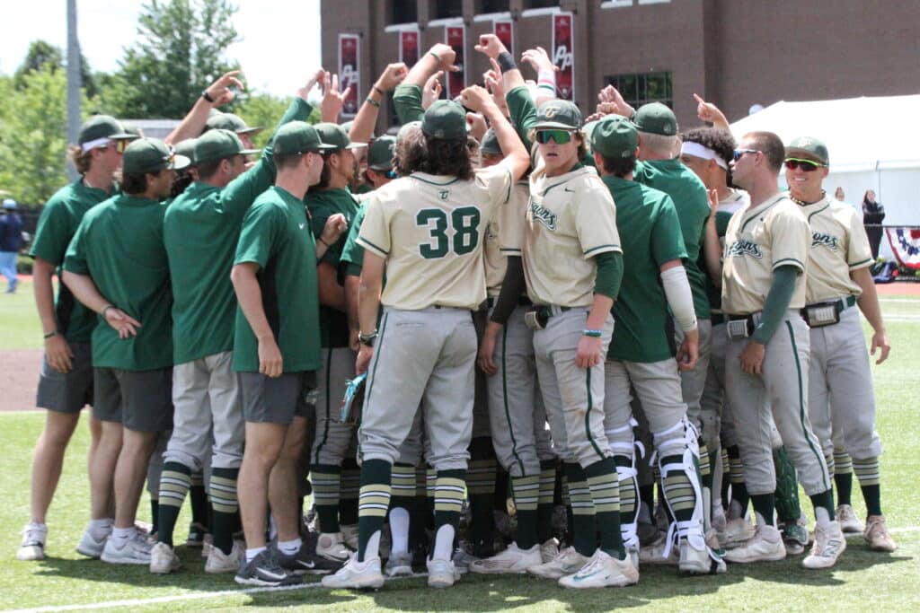 baseball team cheering before a game