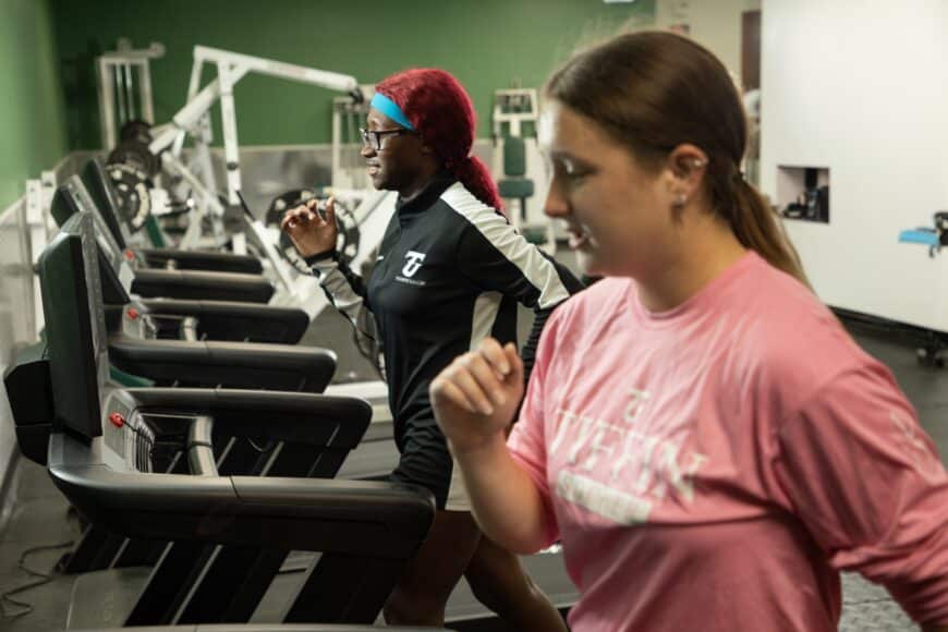 students on treadmills in hanson fitness center