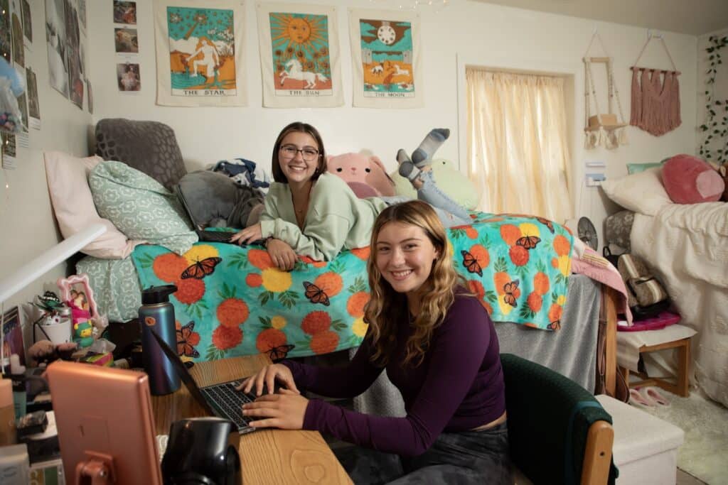 students in dorm room at college
