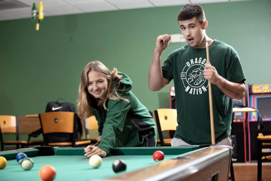 students playing pool