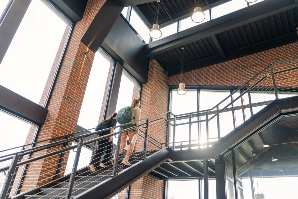 Students walking up stairs at the Science building