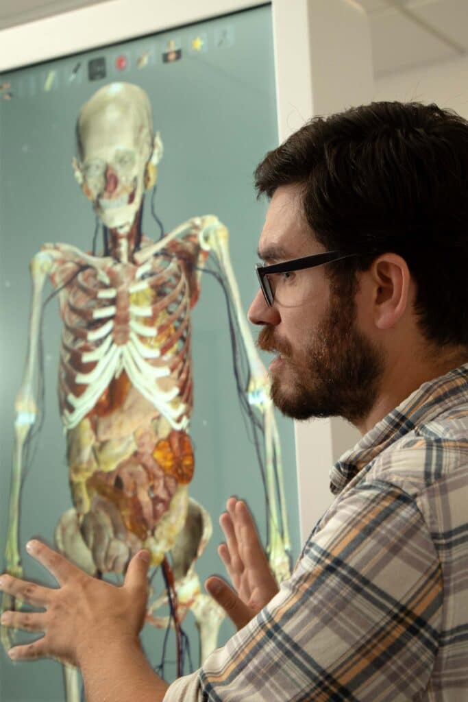 professor showing anatomage table