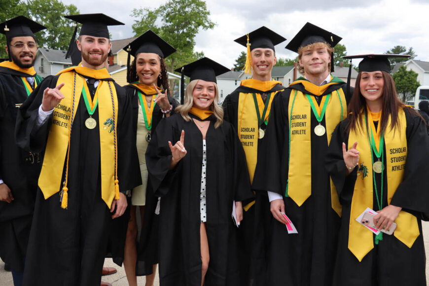 graduates posing for a group photo