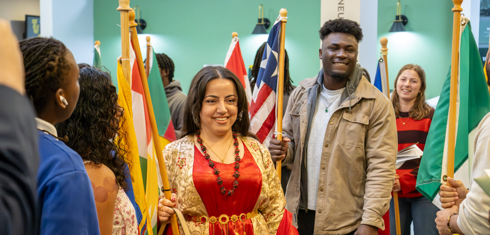woman holding flag smiling