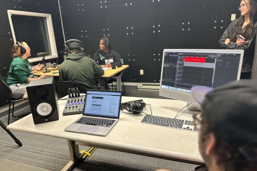 sports media team recording a podcast